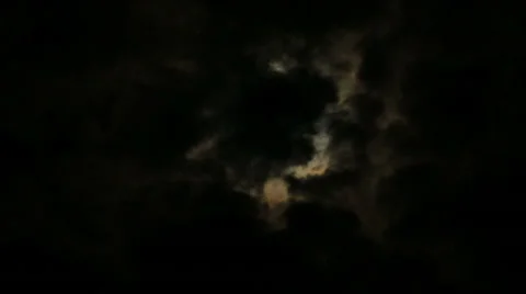 Fullmoon and mystic clouds with red halo Stock Footage 51618352