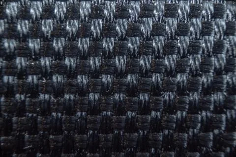 Fullscreen macro close-up with shallow depth of field of a kevlar-like textur Stock Photos