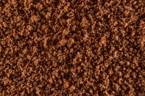 Fullscreen macro closeup with shallow depth of field of instant coffee powder Stock Photos