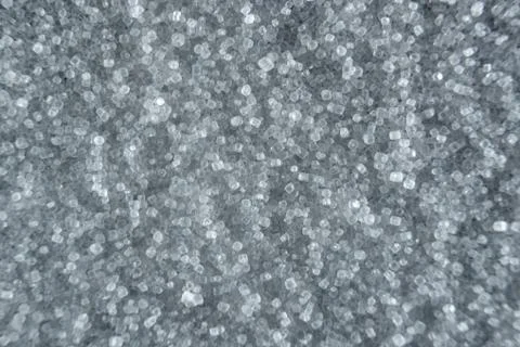 Fullscreen macro closeup with shallow depth of field of small grains of fine  Stock Photos