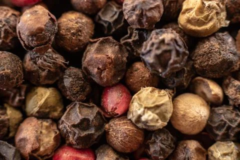 Fullscreen macro closeup with shallow depth of field of unmilled red, green,  Stock Photos