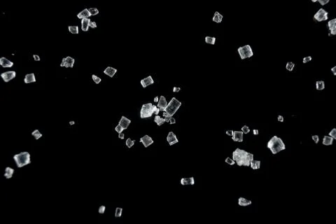 Fullscreen macro closeup with shallow depth of field of small sugar grains on Stock Photos