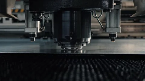 Fully automated operation of a CNC stamping machine in a high-tech facility Stock Footage 265508731