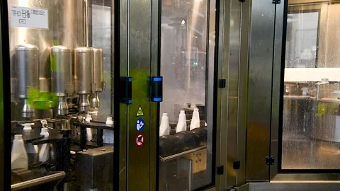 Fully automated production of plastic bottles for household chemicals Video stock 339914490
