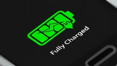 Fully Charged Battery Symbol Blinking on Smart Phone Stock Footage 117777237