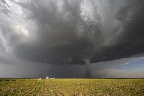 Fully Condensed Tornado, a rotating column of air reaching to the ground, a.. Stock Photos