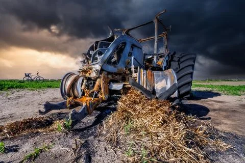 Fully destroyed burnt down tractor Stock Photos