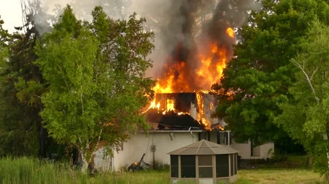 Fully Involved House Fire With Partial Collapse Video stock 65750003
