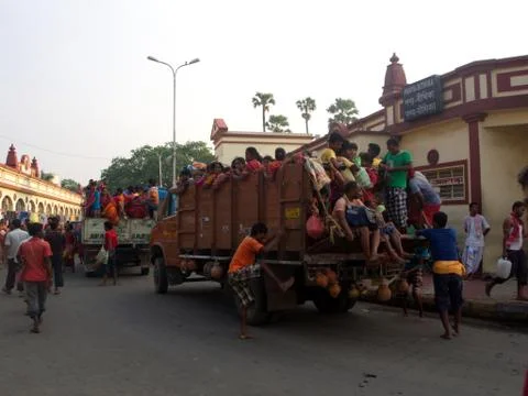 Fully Load and over load of Crowded Indian People in the truck,Kolkata City,  Stock Photos