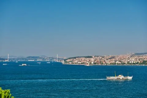 Fully loaded container ship moving through Bosprus Stock Photos