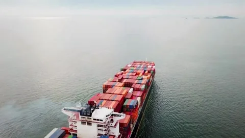 Fully loaded container ship on open ocean sea logistics import export shipping Stock Footage 336445851