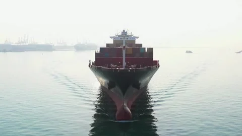 Fully loaded container ship on open ocean logistics import export shipping Stock Footage 336445857