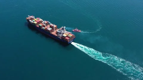 Fully loaded container ship on open ocean sea logistics import export shipping Stock Footage 336445876