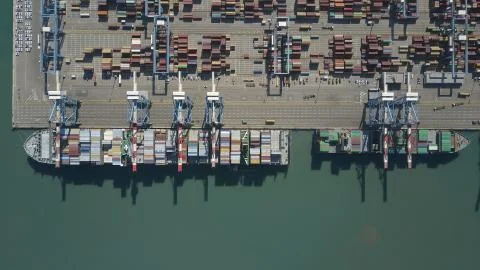 Fully loaded container ships docked at freight port terminal 스톡 사진
