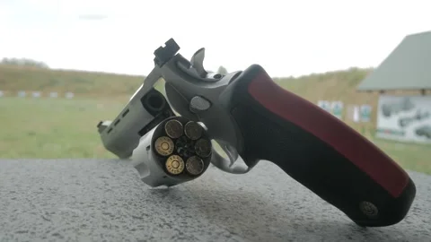 Fully loaded revolver at the shooting range Stock Footage 194795507