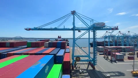 Fully loaded ultra large container vessel has cargo operations Stock Footage 242828049