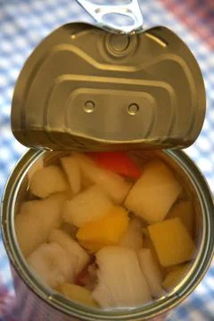 Fully opened fruit salad can with copy space 写真素材