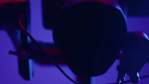 Fully rigged dslr video camera on a electronic 3-axis gimbal moving around on Stock Footage 249474024