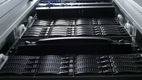 In Fully Working Data Center IT Engineer Installs Hard Drive into Server Rack. Stock Footage 114504209