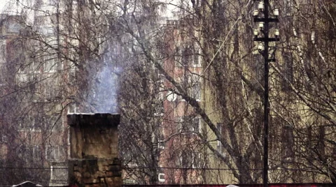 Fuming chimney and intense snowfalls in the city. Stock Footage 61248151