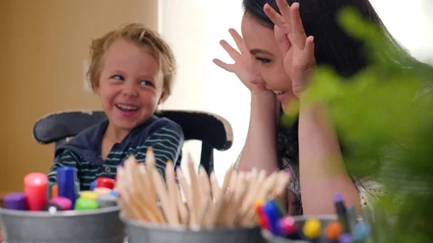 A Fun Activity Of Mom And Son While Homeschooling Stock-Footage 129498416