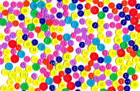 Fun and colorful pattern of plastic buttons Stock Photos