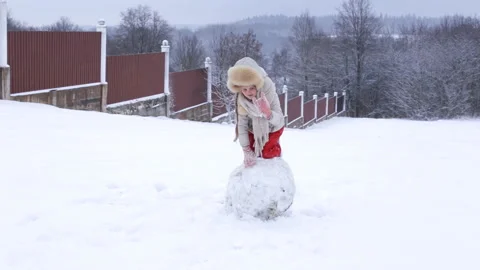 Fun child play in the snow. Winter weekend outside the city. Video stock 150057035