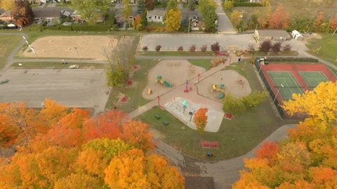 Fun city park located in small town in beautiful fall season by drone Stock Footage 119190211