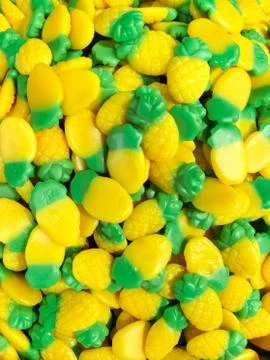 Fun colorful pineapple candy background Foto stock