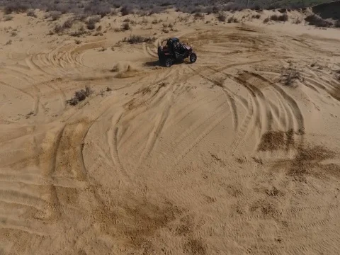 Fun Cruiser rides through the desert and along the steppe race of the rally Stock Footage 74579313
