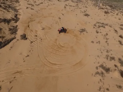 Fun Cruiser rides through the desert and along the steppe race of the rally Stock Footage 74579420