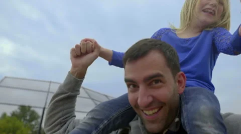Fun on dads shoulders Stock Footage 58635099