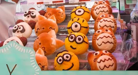 Fun donuts in the shape of animals and minions Stock Photos