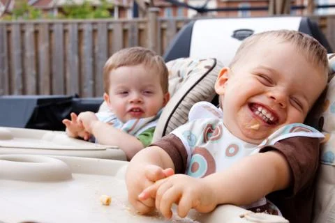 Fun during feed time Stock Photos