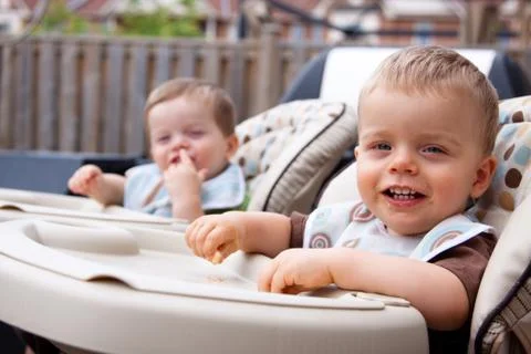 Fun during feed time Stock Photos