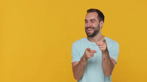 Fun expressive young man 20s years old in basic casual blue t-shirt look camera Video stock 148289915