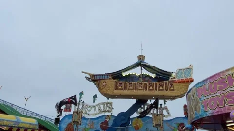 Fun fair at the beach rides and thrill of the fair 스톡 동영상 137589521