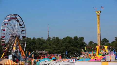 Fun at the Fair - Ferris Wheel and Carousel Stock-Footage 918148