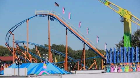 Fun at the Fair - G-Force Ride and Rollercoaster Stock-Footage 916140