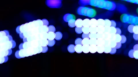 Fun Fair at night flickering lights arrow symbols Stock Footage 62775644