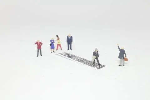 A fun figure cross the bar code 写真素材