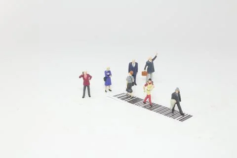 A fun figure cross the bar code Stock Photos