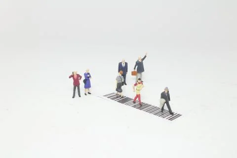 A fun figure cross the bar code Stock-Fotos