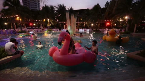 Fun floats at pool party Stock Footage 140071092