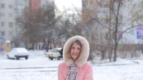 Fun girl throws the snow Stock Footage 70457242