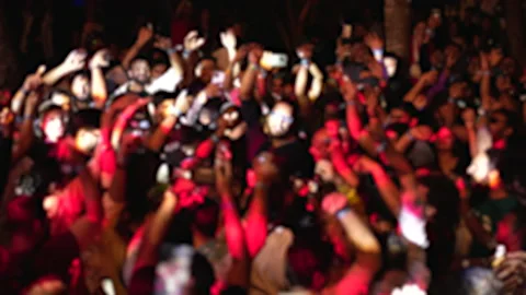 Fun indian crowd jump night club party. Lots of people hang out rave party India Stock Footage 240075861