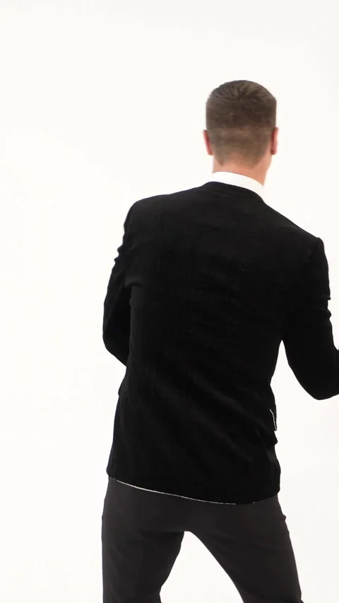 Fun man in a black suit  Stock Footage 293678532