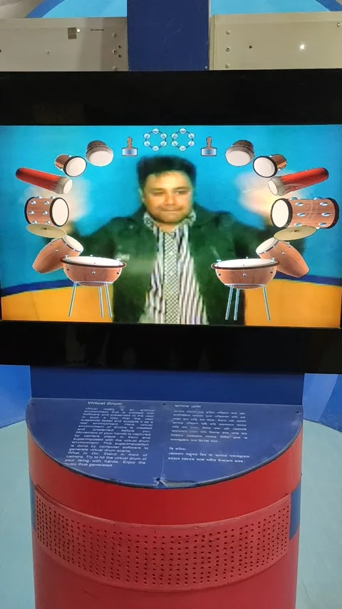 Fun - A man playing with virtual music instruments Video stock 141189058