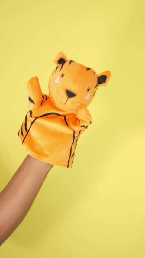 Fun puppet performance with a fluffy tiger character Stock Footage 315738312