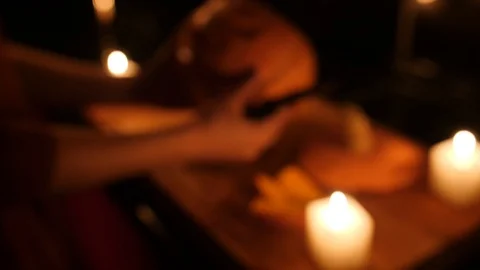 Fun small pumpkin on the cutting board in dark kitchen Stock Footage 97379950